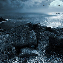 Fullmoon over the ocean by Jaroslaw Grudzinski