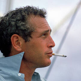 Portrait Of Paul Newman Smoking by Mark Kauffman