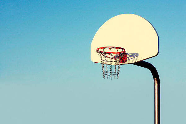 Basketball Hoop Against Blue Sky Wall Art