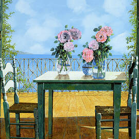 le rose sul tavolo al balcone by Guido Borelli