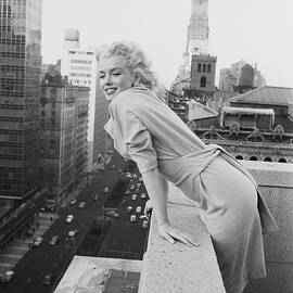 Marilyn On The Roof by Michael Ochs Archives