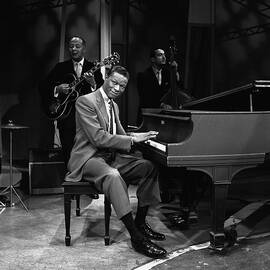 Nat King Cole Performs On Stage by Cbs Photo Archive
