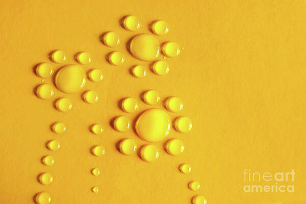 Yellow Droplets on Surface Wall Art